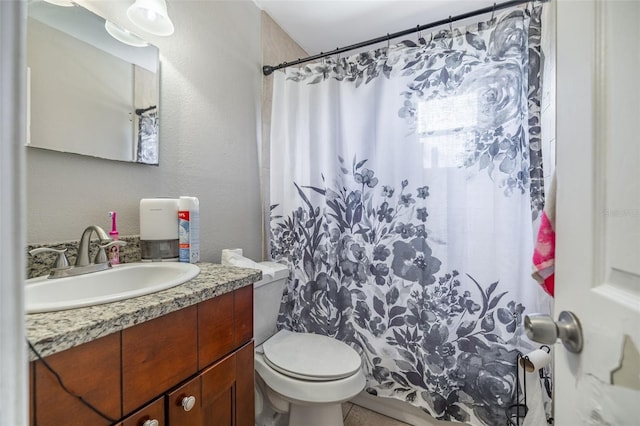 1771 Russell St S, Saint Petersburg, FL 33712 - full bathroom with vanity, curtained shower, and a textured wall