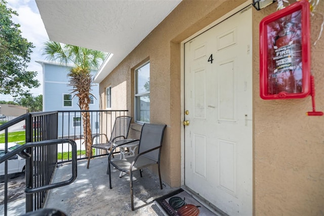 1771 Russell St S, Saint Petersburg, FL 33712 - property entrance with stucco siding