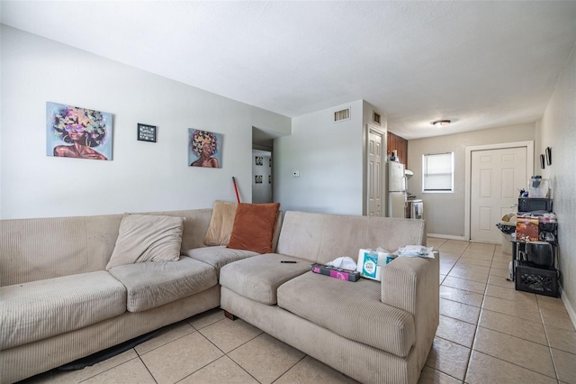 1771 Russell St S, Saint Petersburg, FL 33712 - living area with light tile patterned flooring