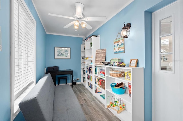 3905 31st Ave W, Bradenton, FL 34205 - playroom with wood finished floors, ceiling fan, and ornamental molding