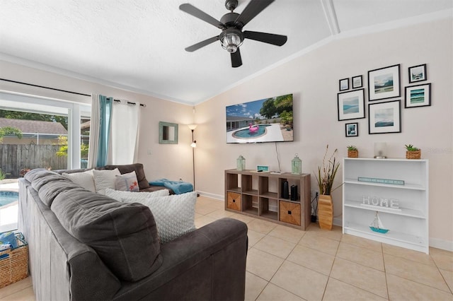 3905 31st Ave W, Bradenton, FL 34205 - living room featuring vaulted ceiling, light tile patterned floors, a ceiling fan, and crown molding