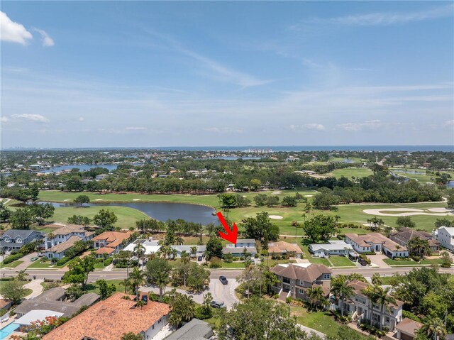 167 Almedo Way NE, Saint Petersburg, FL 33704 - aerial perspective of suburban area with a local golf course and a large body of water