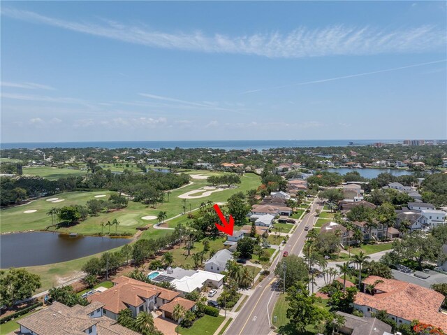 167 Almedo Way NE, Saint Petersburg, FL 33704 - aerial view of residential area featuring a local golf course and a large body of water