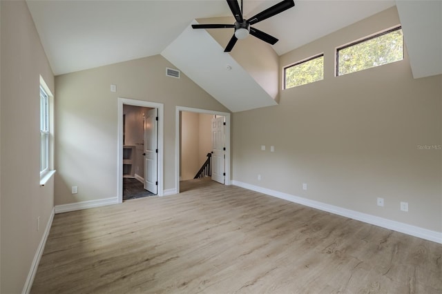 4044 Red Fox Ct, Wesley Chapel, FL 33543 - unfurnished bedroom with wood finished floors, lofted ceiling, baseboards, ceiling fan, and ensuite bathroom