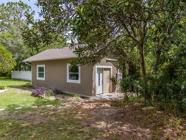 4044 Red Fox Ct, Wesley Chapel, FL 33543 - view of front of home with stucco siding