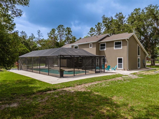 4044 Red Fox Ct, Wesley Chapel, FL 33543 - outdoor pool featuring a patio, a lawn, and a lanai