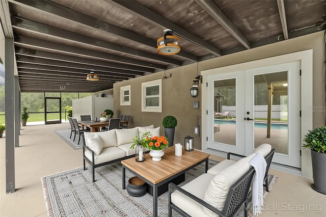 4044 Red Fox Ct, Wesley Chapel, FL 33543 - view of patio featuring french doors, an outdoor living space, and outdoor dining space