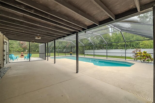 4044 Red Fox Ct, Wesley Chapel, FL 33543 - view of pool featuring a patio, a fenced backyard, and glass enclosure