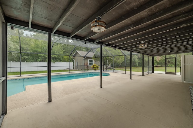 4044 Red Fox Ct, Wesley Chapel, FL 33543 - view of swimming pool featuring a patio, a fenced backyard, and glass enclosure