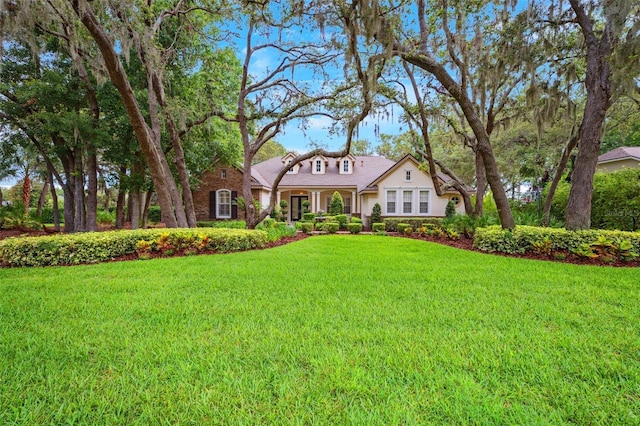 17802 Mission Oak Dr, Lithia, FL 33547 - view of front of home featuring a front lawn and stucco siding