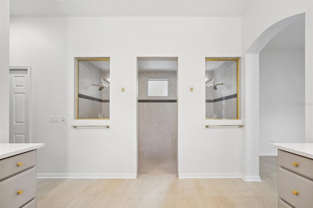 17802 Mission Oak Dr, Lithia, FL 33547 - hall with arched walkways and baseboards