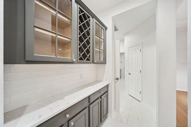 17802 Mission Oak Dr, Lithia, FL 33547 - hall with light marble finish flooring and baseboards
