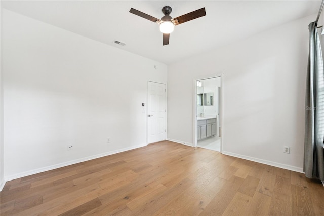 17802 Mission Oak Dr, Lithia, FL 33547 - empty room featuring ceiling fan, light wood finished floors, and baseboards