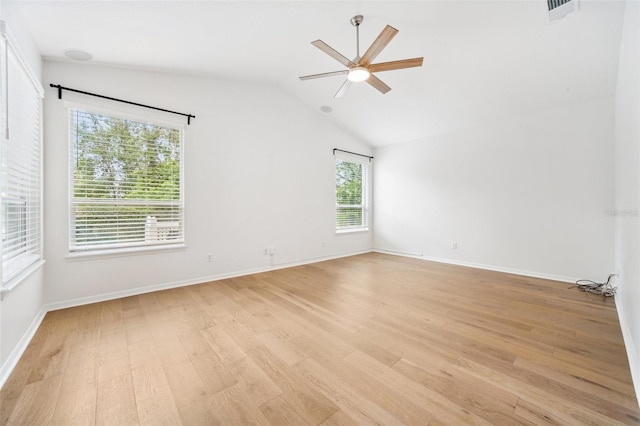 17802 Mission Oak Dr, Lithia, FL 33547 - spare room with healthy amount of natural light, light wood-style flooring, ceiling fan, and lofted ceiling