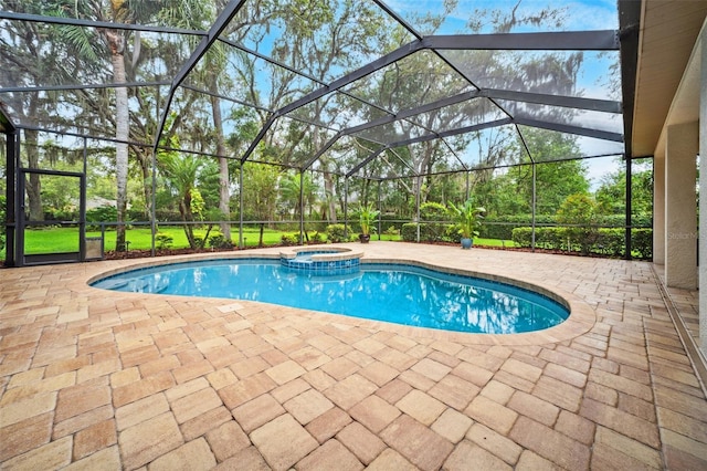 17802 Mission Oak Dr, Lithia, FL 33547 - view of swimming pool with a patio area, a pool with connected hot tub, and glass enclosure