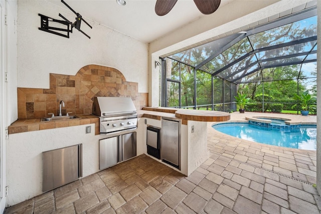 17802 Mission Oak Dr, Lithia, FL 33547 - view of swimming pool with a sink, ceiling fan, a patio, a lanai, and a pool with connected hot tub