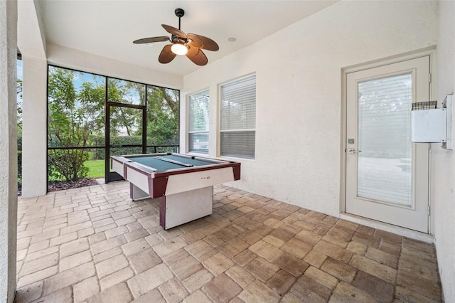 17802 Mission Oak Dr, Lithia, FL 33547 - unfurnished sunroom with billiards table and a hot tub