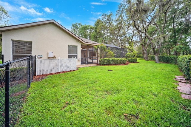 17802 Mission Oak Dr, Lithia, FL 33547 - view of yard featuring a sunroom