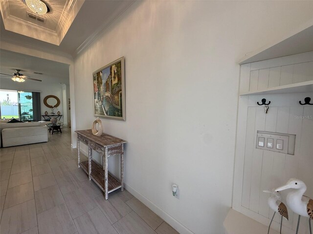 17304 Scuba Crest St, Wimauma, FL 33598 - hall with ornamental molding and a raised ceiling