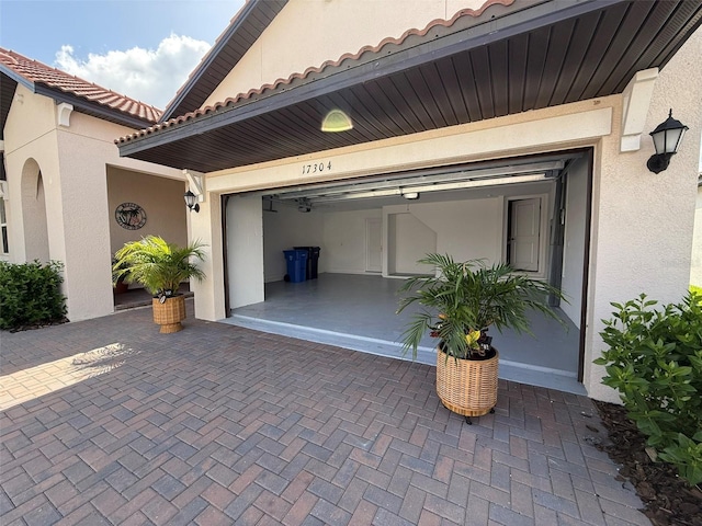 17304 Scuba Crest St, Wimauma, FL 33598 - garage featuring decorative driveway