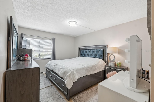 11809 Raintree Lake Ln Unit A, Tampa, FL 33617 - bedroom featuring a textured ceiling