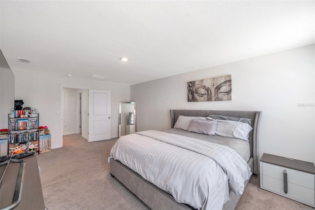 7641 Sail Clover Ln, Zephyrhills, FL 33540 - bedroom with light carpet and baseboards