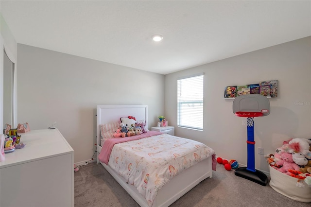7641 Sail Clover Ln, Zephyrhills, FL 33540 - bedroom with light colored carpet and baseboards