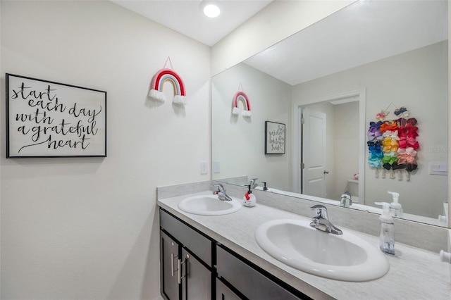 7641 Sail Clover Ln, Zephyrhills, FL 33540 - full bath featuring double vanity and toilet