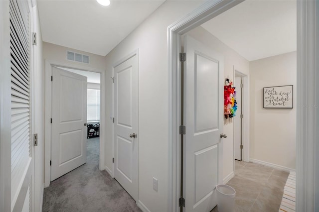 7641 Sail Clover Ln, Zephyrhills, FL 33540 - corridor featuring baseboards