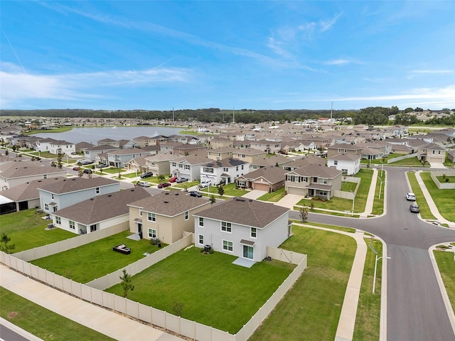 7641 Sail Clover Ln, Zephyrhills, FL 33540 - aerial perspective of suburban area with a nearby body of water