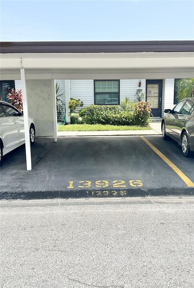13926 Mission Oaks Blvd, Seminole, FL 33776 - view of covered parking lot