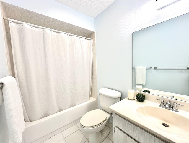 13926 Mission Oaks Blvd, Seminole, FL 33776 - bathroom with shower / bath combo, vanity, toilet, tile patterned floors, and a textured ceiling