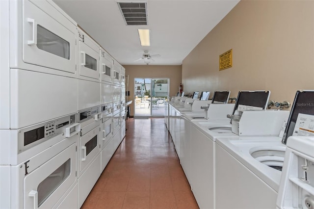 13926 Mission Oaks Blvd, Seminole, FL 33776 - shared laundry room with stacked washer / drying machine, washer and clothes dryer, light tile patterned flooring, and a ceiling fan