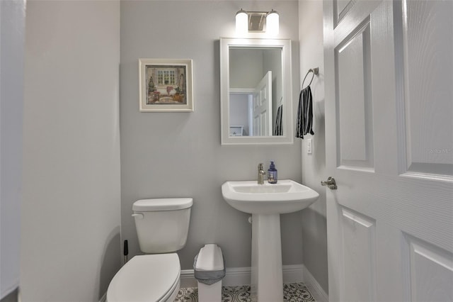 5511 Del Coronado Dr, Apollo Beach, FL 33572 - half bathroom featuring toilet and baseboards