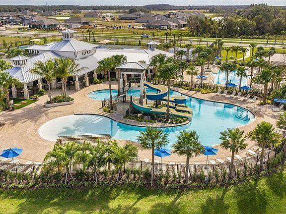 5511 Del Coronado Dr, Apollo Beach, FL 33572 - community pool featuring a water slide and a gazebo