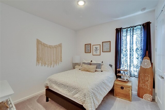 11785 Little River Way, Parrish, FL 34219 - carpeted bedroom featuring baseboards
