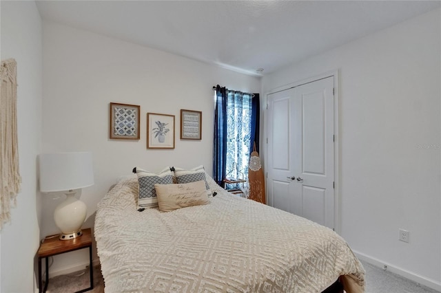 11785 Little River Way, Parrish, FL 34219 - carpeted bedroom featuring baseboards and a closet