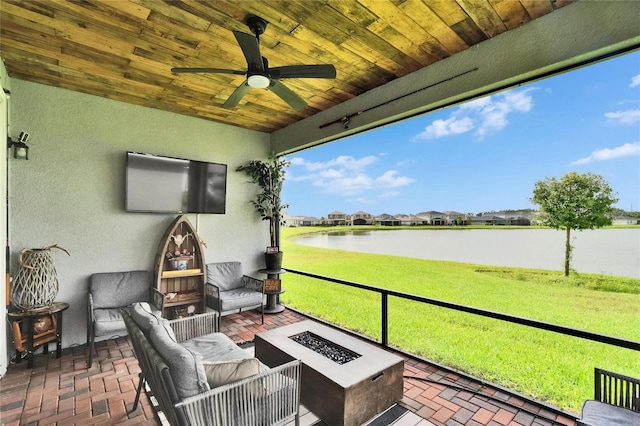 11785 Little River Way, Parrish, FL 34219 - sunroom / solarium featuring ceiling fan and an outdoor living space with a fire pit