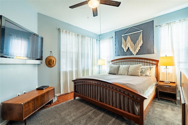 14320 Tree Swallow Way, Lakewood Ranch, FL 34202 - bedroom featuring ceiling fan and wood finished floors