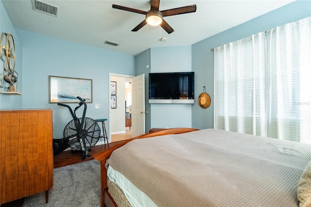 14320 Tree Swallow Way, Lakewood Ranch, FL 34202 - bedroom featuring wood finished floors, ceiling fan, and baseboards