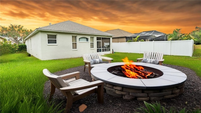 14320 Tree Swallow Way, Lakewood Ranch, FL 34202 - view of patio / terrace with an outdoor fire pit and a sunroom