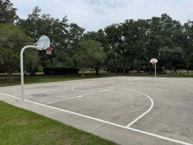 5519 Reflections Blvd, Lutz, FL 33558 - view of basketball court featuring community basketball court and view of wooded area