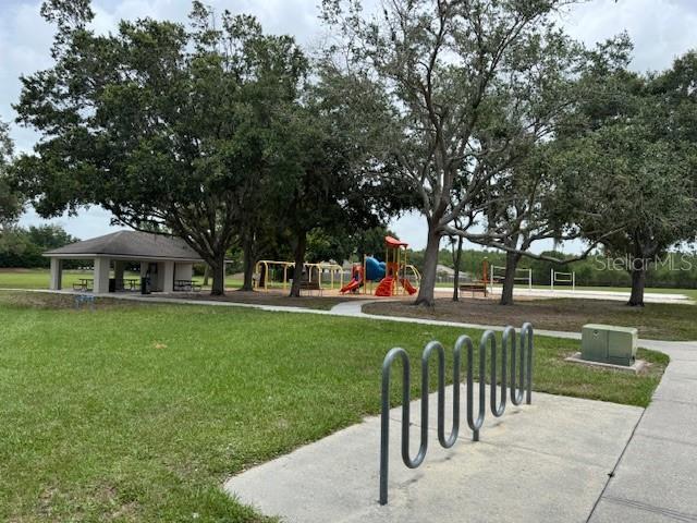 5519 Reflections Blvd, Lutz, FL 33558 - view of property's community featuring a gazebo and a yard