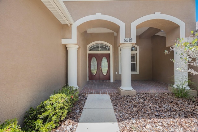 5519 Reflections Blvd, Lutz, FL 33558 - doorway to property with stucco siding