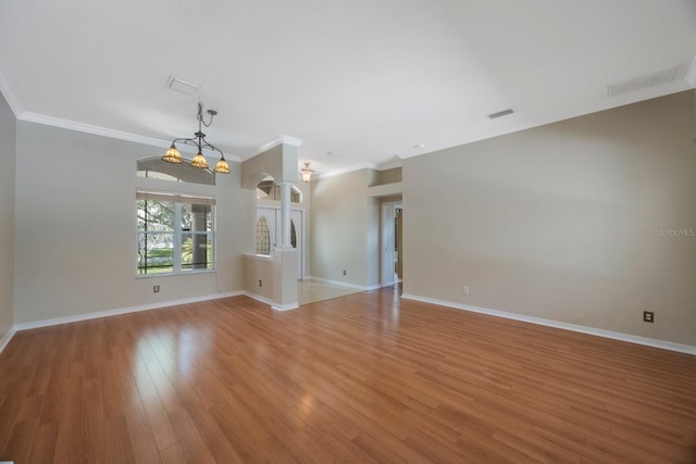 5519 Reflections Blvd, Lutz, FL 33558 - unfurnished living room featuring ornamental molding, light wood finished floors, and baseboards