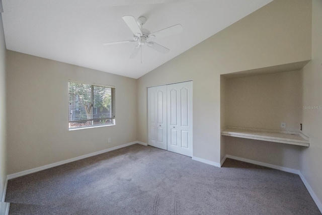 5519 Reflections Blvd, Lutz, FL 33558 - unfurnished bedroom featuring carpet floors, baseboards, a closet, lofted ceiling, and ceiling fan