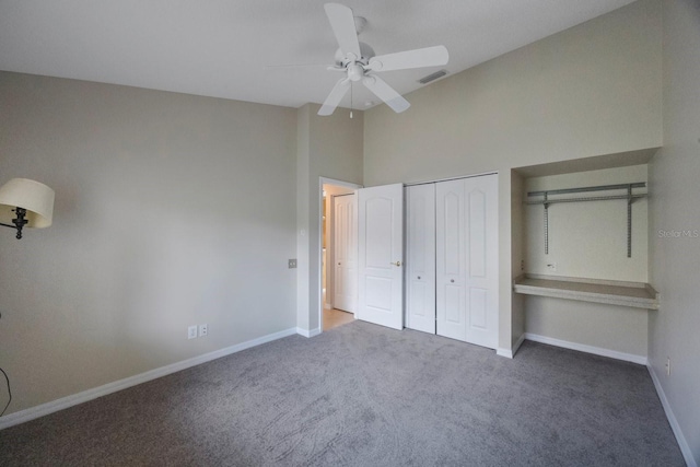 5519 Reflections Blvd, Lutz, FL 33558 - unfurnished bedroom featuring carpet flooring, baseboards, a ceiling fan, and vaulted ceiling