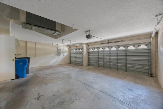 5519 Reflections Blvd, Lutz, FL 33558 - garage featuring a garage door opener and electric panel