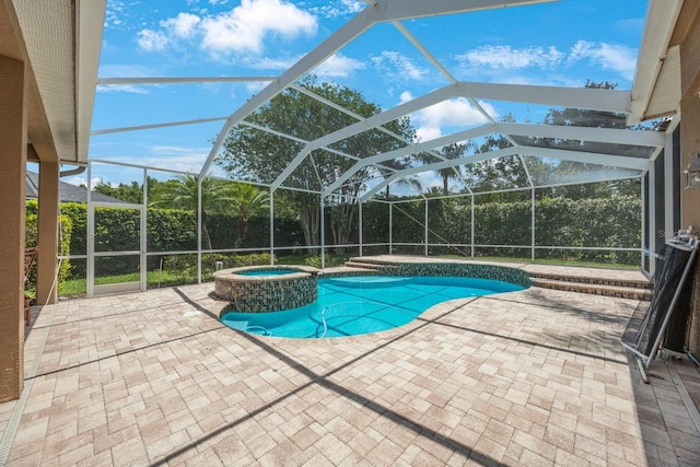 5519 Reflections Blvd, Lutz, FL 33558 - view of pool with a patio, a pool with connected hot tub, and a lanai