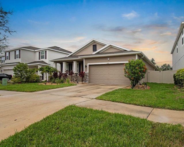 5006 Jackel Chase Dr, Wimauma, FL 33598 - view of front of home featuring a garage and driveway